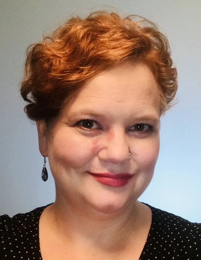 A woman with red hair.